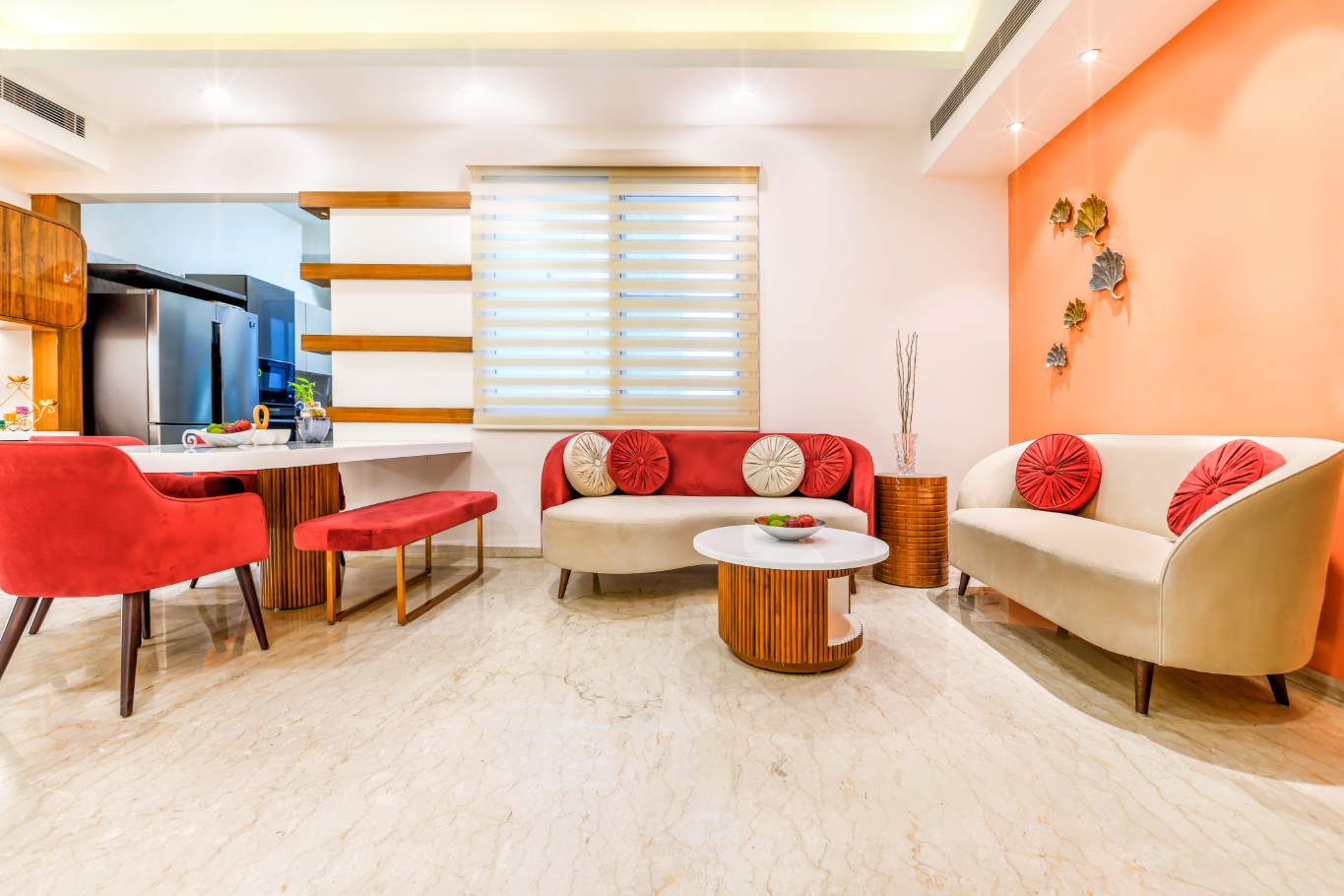 This residence by Studio Meraki enjoys views of the skyline and brings the coral hue inside