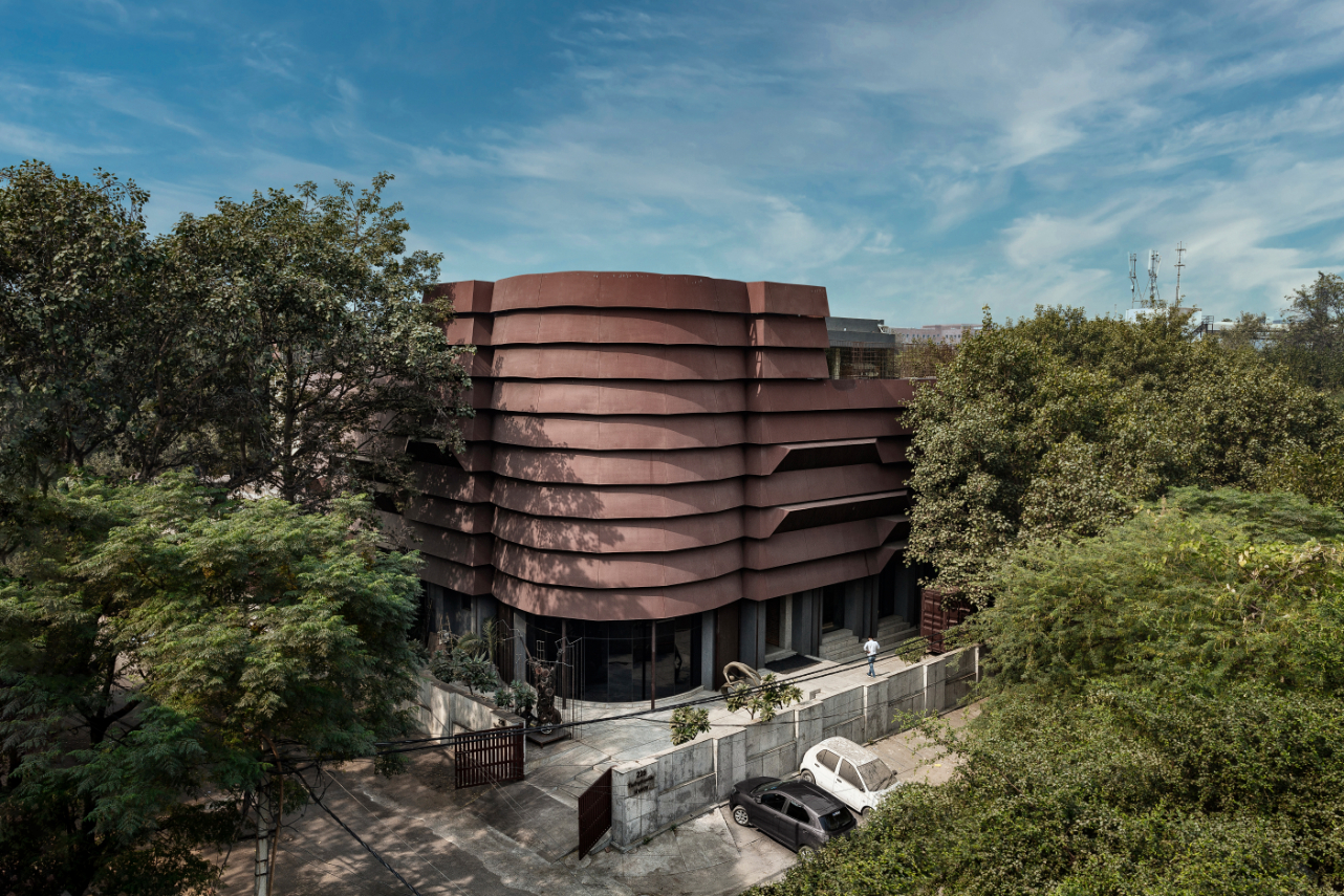 A rugged industrial façade retrofitted right into a reinterpretation of ...