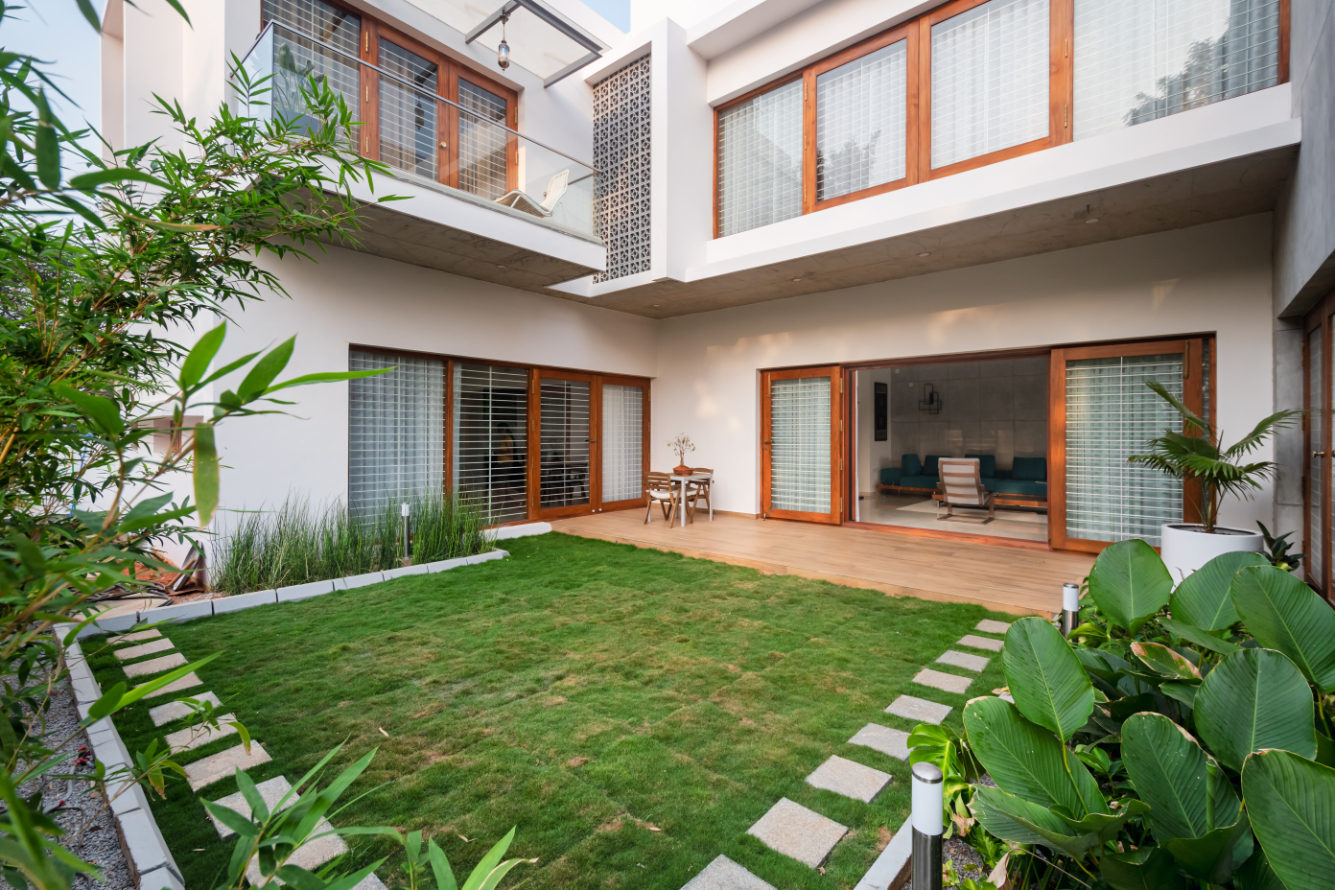 Unnati The Urban Courtyard House Architect And Interiors India u-shaped-house-plans-with-central-courtyard-4-swimming-pool-g-cltsd