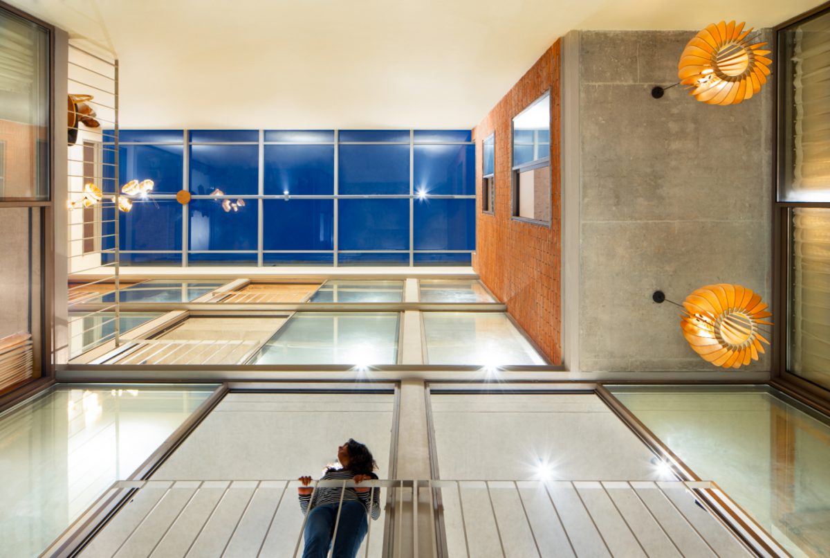 Stacked House- Reimagining the Archetype of Poorly-Lit Row-Houses