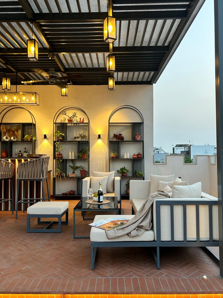 Entertain extravagantly on this 1,800 sq ft rooftop in Noida designed ...