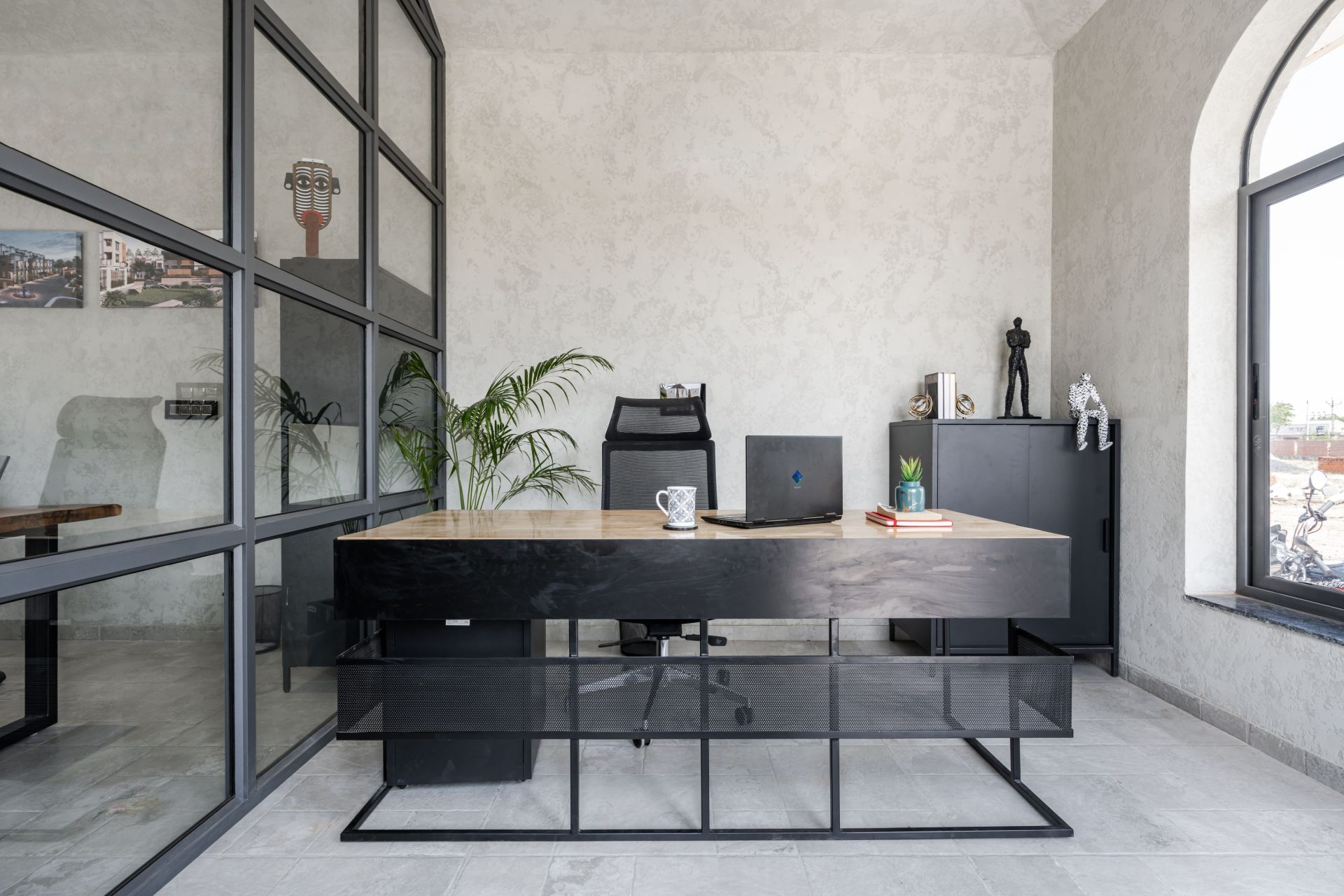 Breathe life into the quiet minimalism of this Ahmedabad office